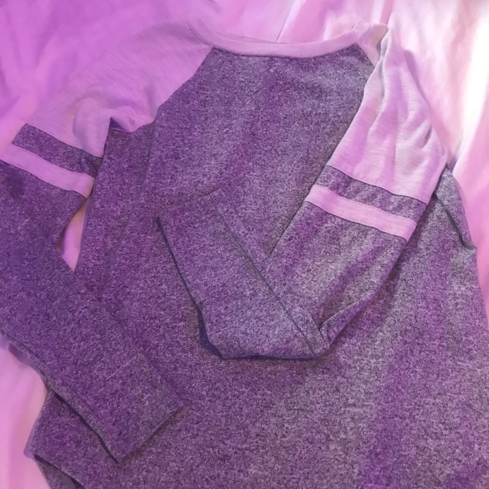 A soft white and grey long sleeve shirt